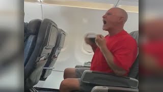 Unruly growling passenger arrested following flight from LAX [upl. by Nylrehc73]