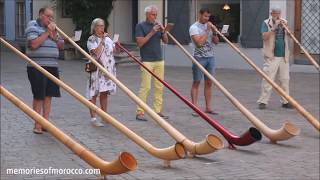 Swiss people playing big horns  Alphorn Players  Alps Horn  Alpine Horns Chur Switzerland [upl. by Akired]