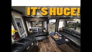 The BIGGEST Slide In Truck Camper EVER  HOST MAMMOTH  TRIPLE POP OUT [upl. by Eciruam476]